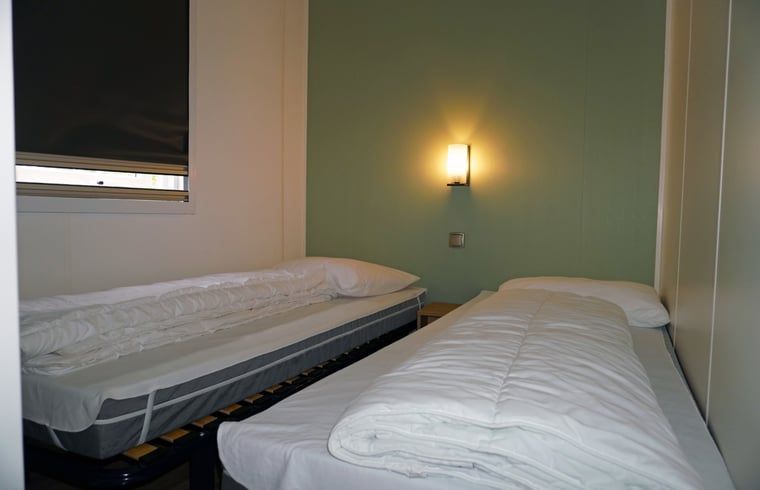 Second bedroom in Cottage in Lieren, vacation home in Lieren, Veluwe. Suitable for families in Gelderland.