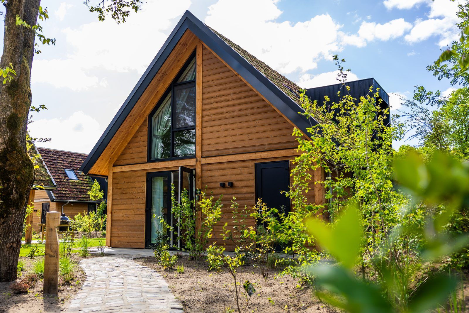 Charmante Waldvilla mit Whirlpool & Sauna in Wekerom, Veluwe, Gelderland. Perfektes Ferienhaus fuer sechs Personen inmitten der Natur.