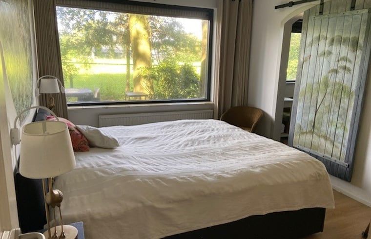 Attraktives Schlafzimmer im Ferienhaus in Nijkerk, Veluwe, mit Aussicht.