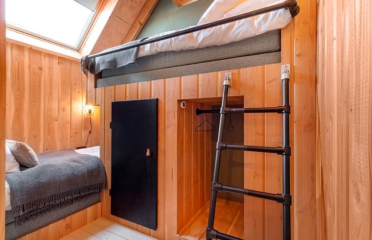 Unieke kinderkamer met stapelbed in Huisje in Veessen, Veluwe, perfect voor een gezinsvakantie.