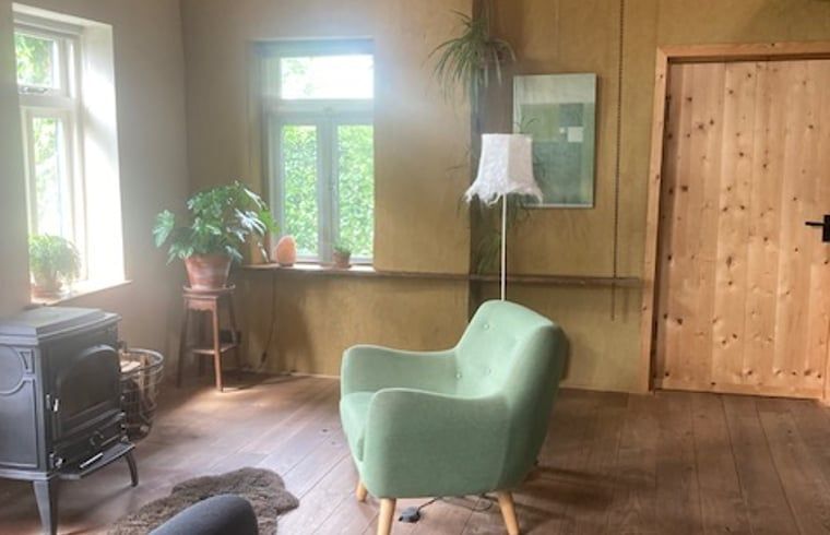 Gezellige woonkamer van Vakantiehuis in Overschild, Noordoost Groningen.