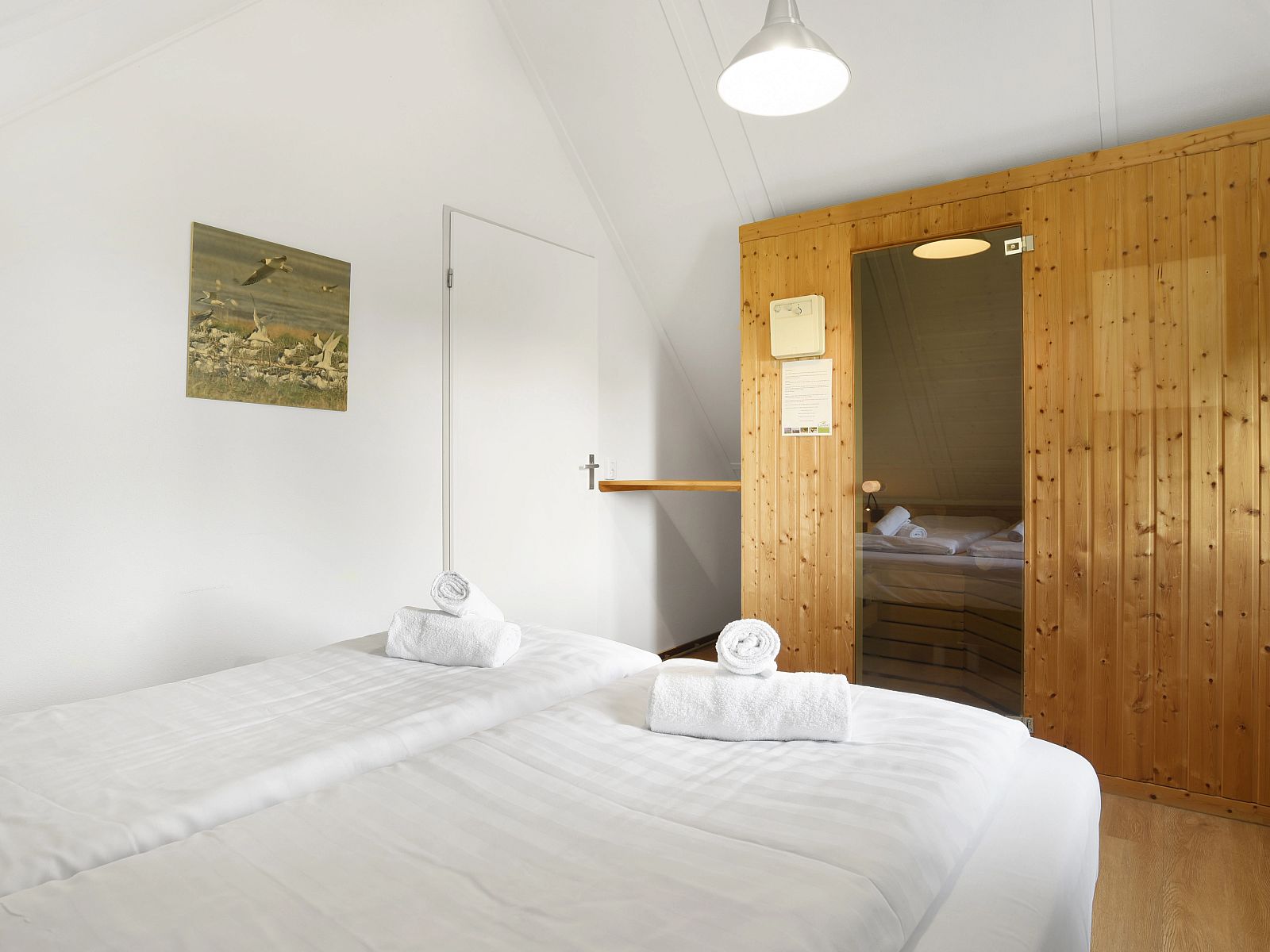 Wooden sauna in Natuurdorp Suyderoogh 4-person bungalow, perfect for relaxation in Lauwersoog.