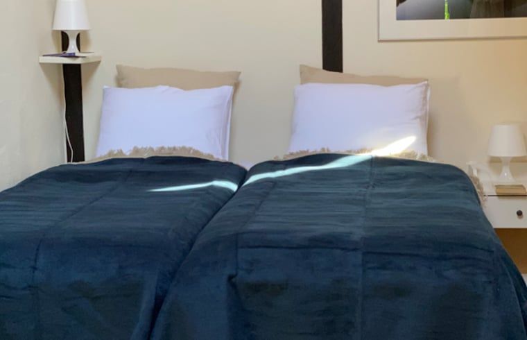 Comfortabele tweepersoonskamer in Vakantiehuisje in Molenrij, ideaal voor een ontspannen verblijf.