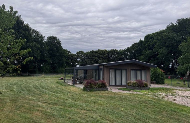 Ferienhaus in Weert, umgeben von gruener Natur in Mittellimburg, ideal fuer einen erholsamen Aufenthalt.