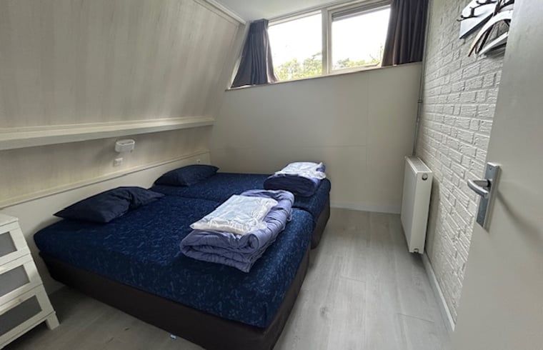 Cozy bedroom in Holiday home in Stramproy, Central Limburg. Enjoy comfort and tranquility in this cozy vacation home.