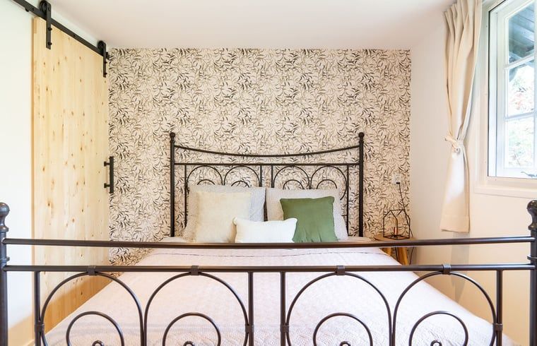 Bright bedroom with striking yellow closet in Cottage in Meijel.