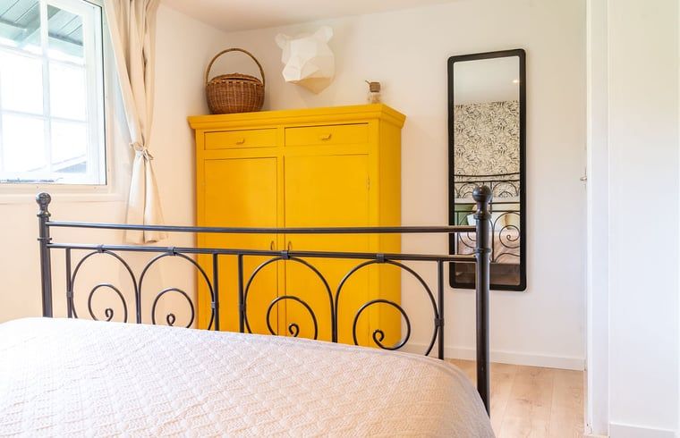 Stylish toilet room in Cottage in Meijel with modern tiles.