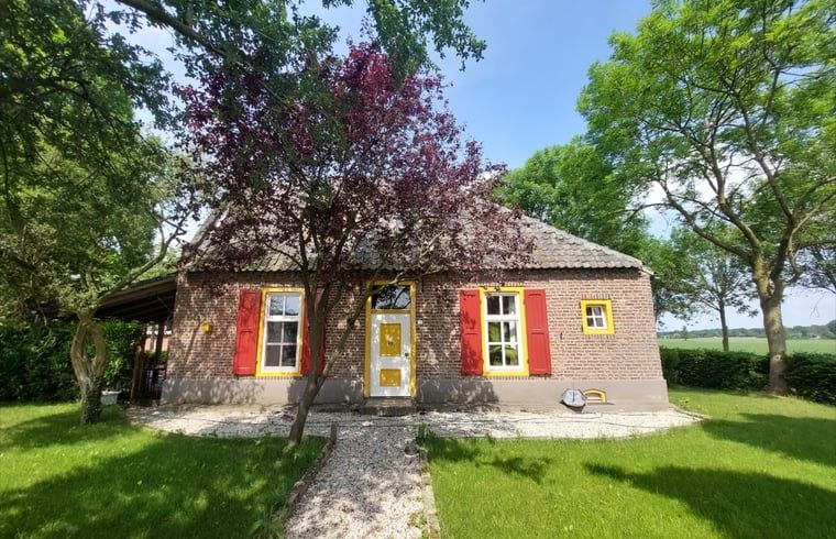 Charmant Vakantiehuisje in Well, Noord Limburg, omgeven door groene natuur en rustieke uitstraling.