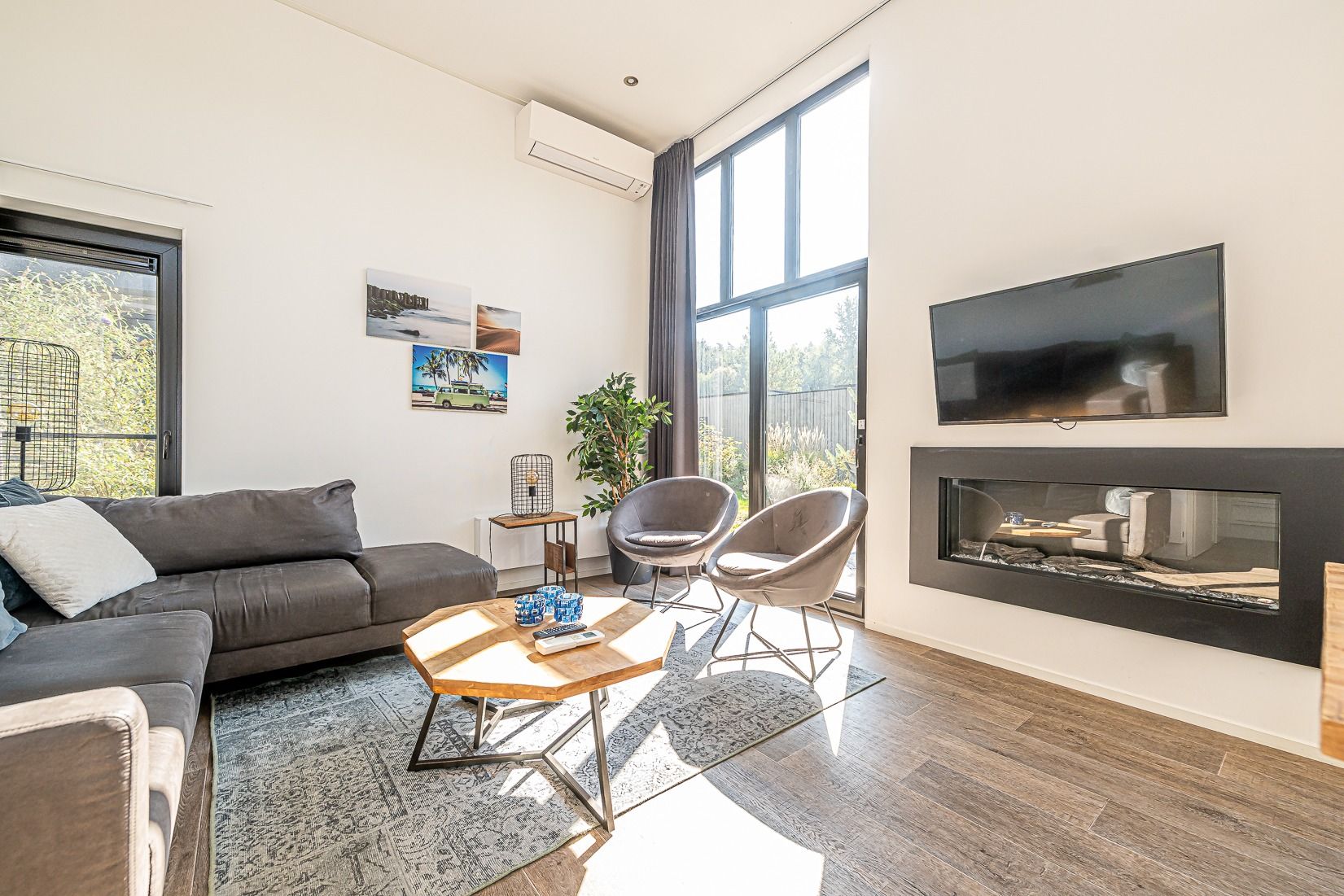 Gemtliches Wohnzimmer mit Sitzecke im Ferienhaus in Belfeld, Nord-Limburg, Limburg.