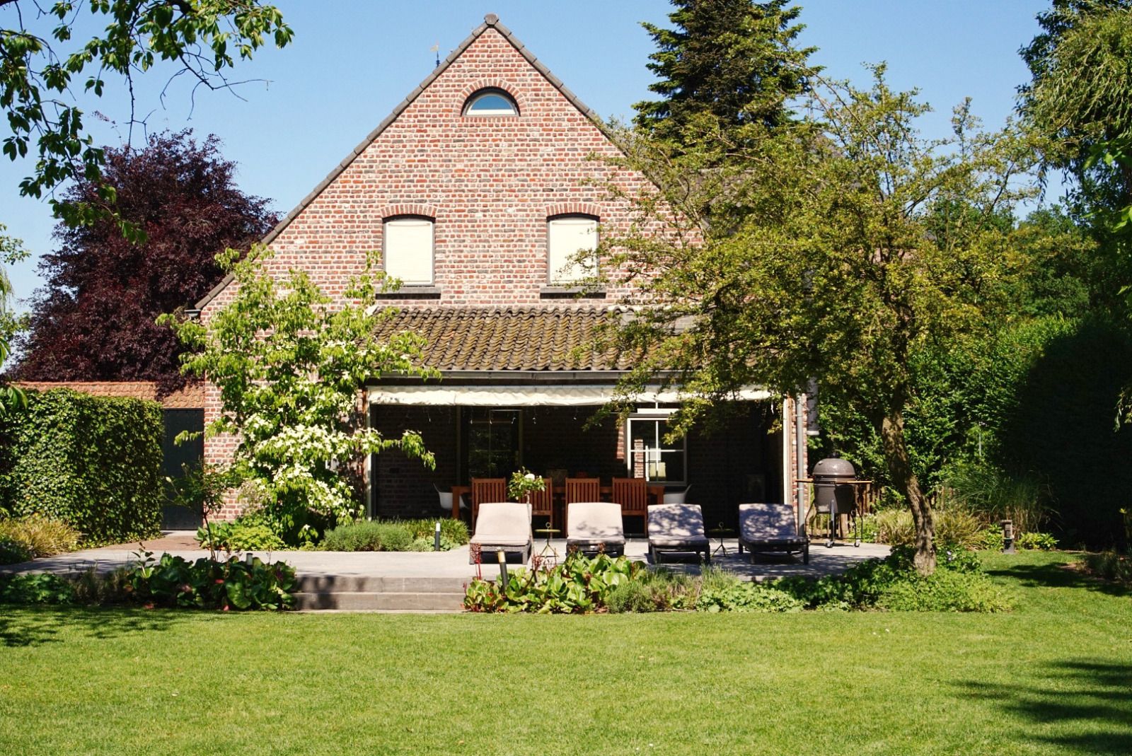 Vacation home L185 in Baarlo, North Limburg with spacious garden and terrace surrounded by green nature.