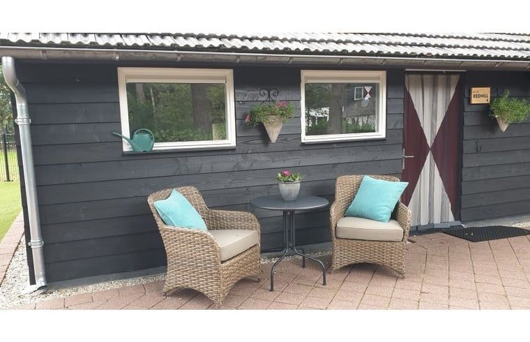 Cozy indoor area of Holiday Home in Heythuysen, North Limburg, with a bright living room and comfortable seating.