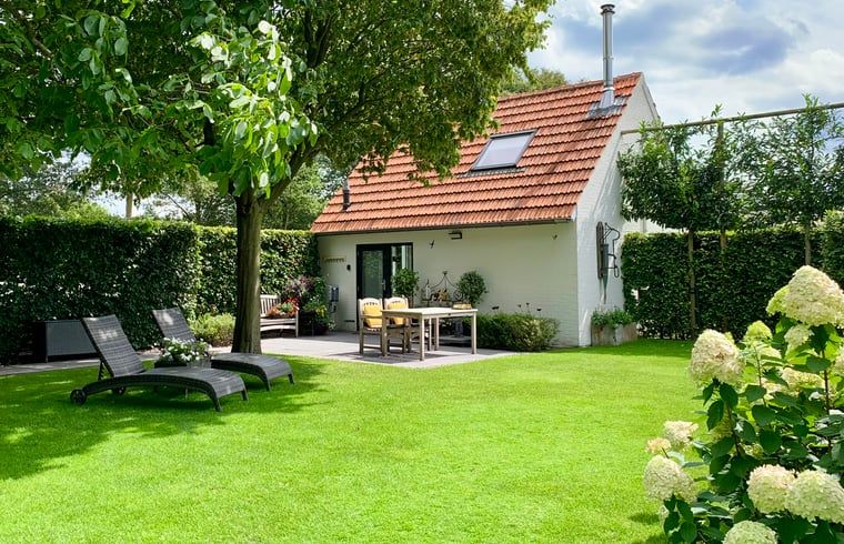 Vakantiehuisje in Heythuysen met groene tuin en terras, Noord Limburg, Limburg.