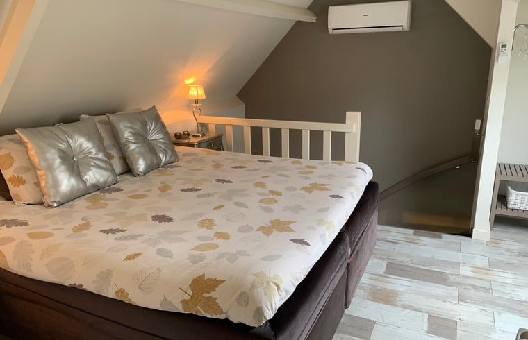 Comfortabele slaapkamer in Vakantiehuisje in Heythuysen, Noord Limburg, Limburg.