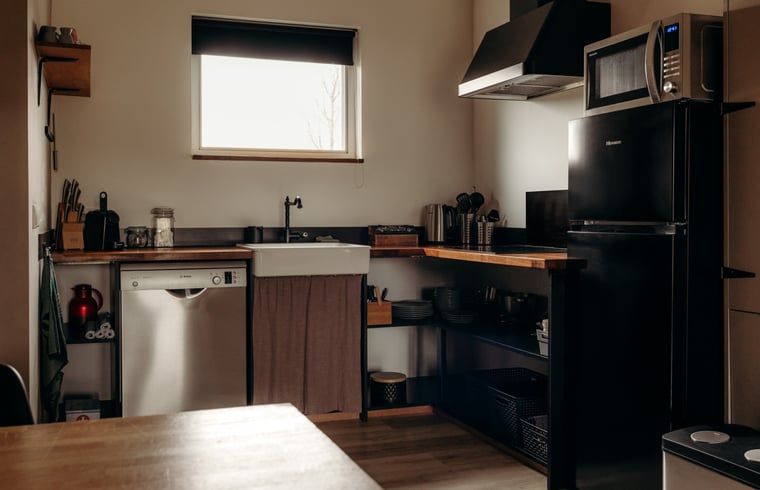 Moderne keuken in Vakantiehuisje in Grashoek, Noord Limburg. Volledig uitgeruste keuken met moderne apparatuur.