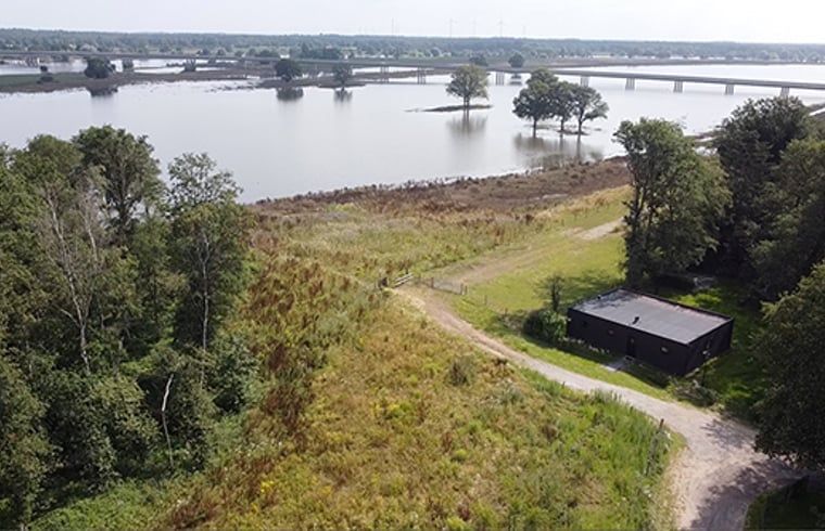 Aerial view of Cottage in Wanssum, vacation home in Limburg overlooking the river.