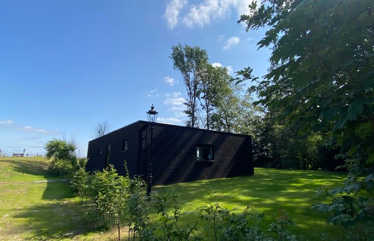 Modern architecture of Huisje in Wanssum, vacation home in Limburg with spacious garden.