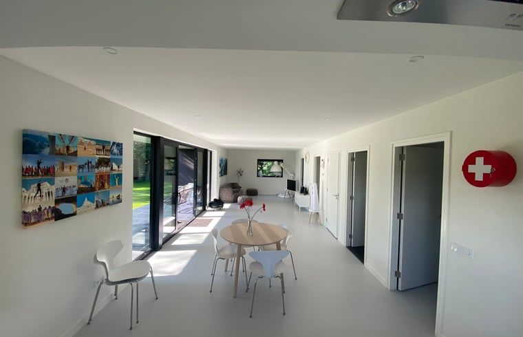 Interior of Cottage in Wanssum, vacation home in North Limburg with bright living room.