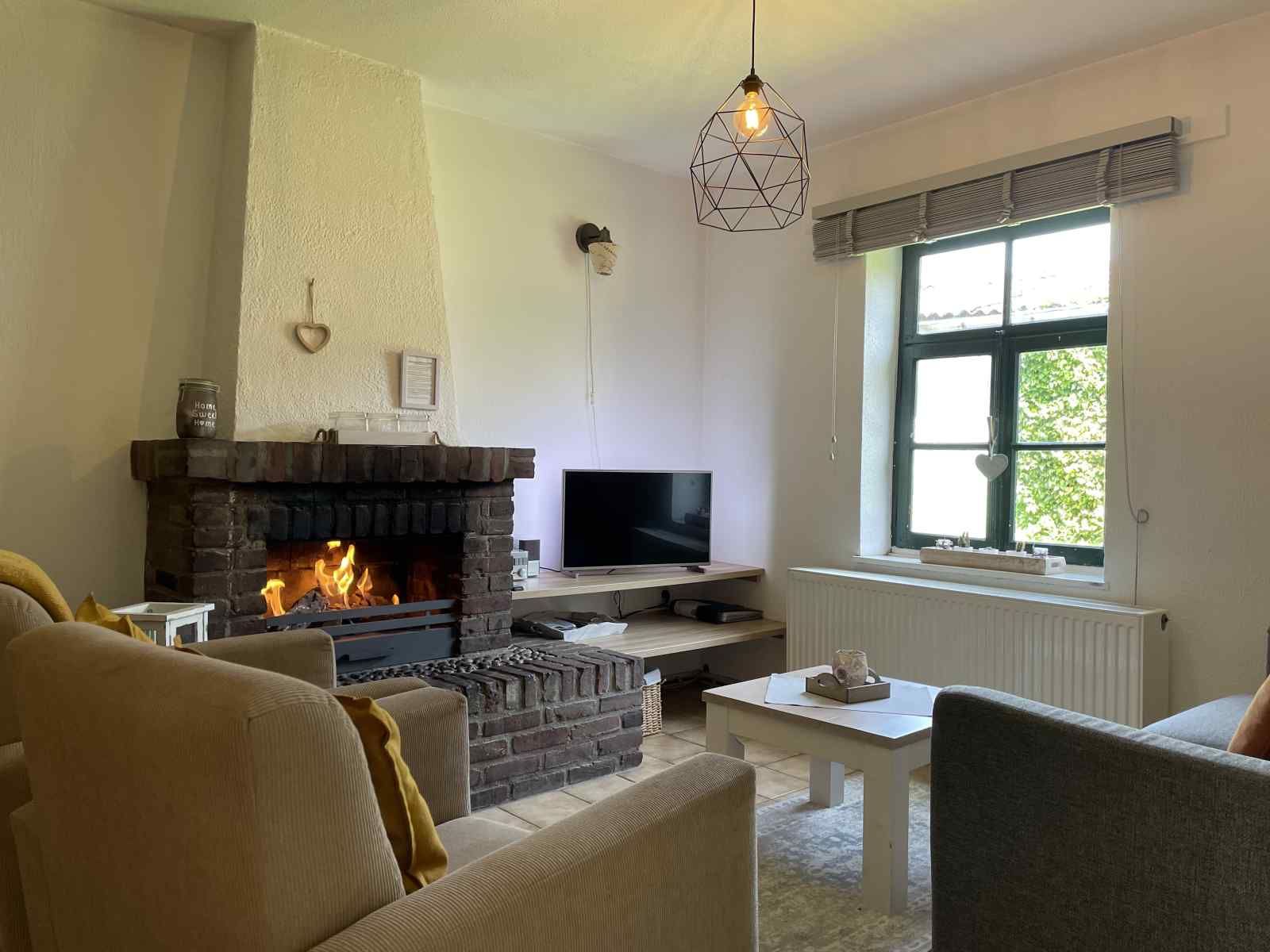 Cozy bedroom with two beds in vacation home L243 in Mechelen, South Limburg.