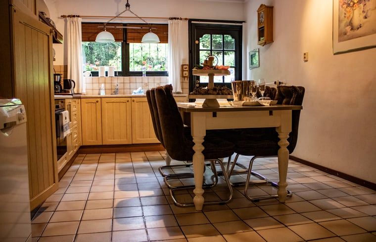 Spacious kitchen with dining area in Cottage in Valkenburg, vacation home in South Limburg.