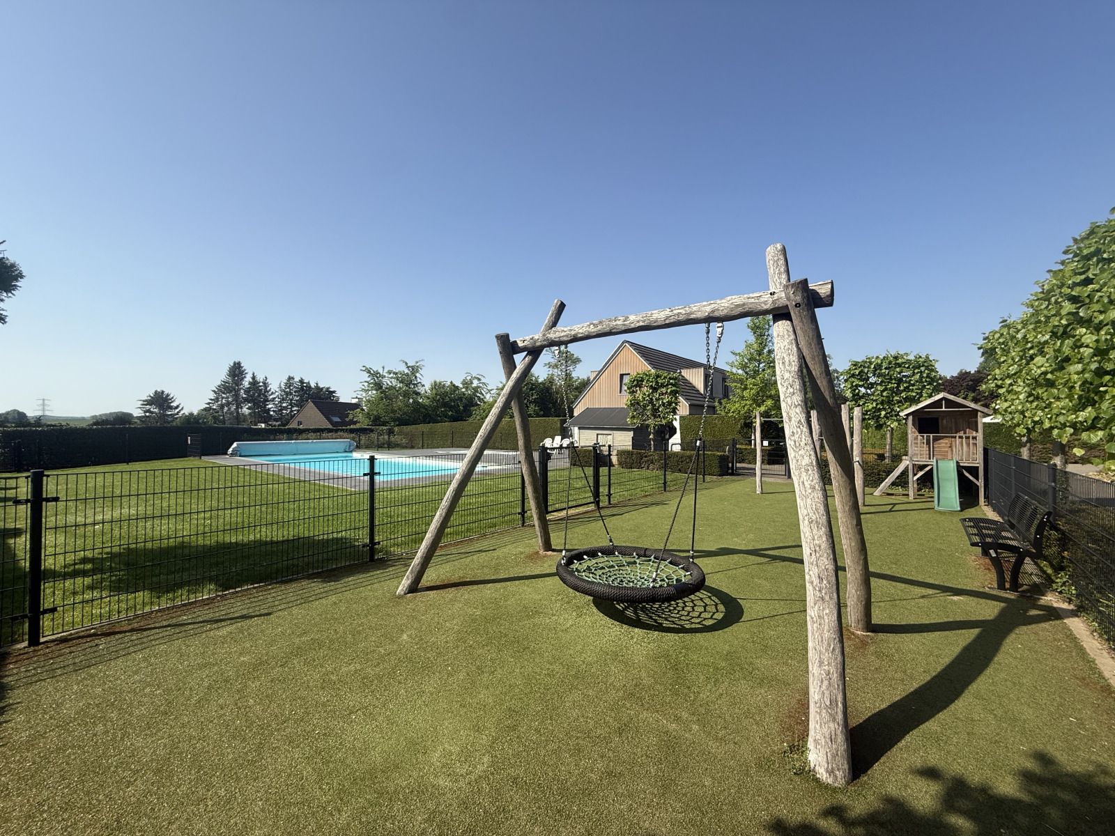 Green play area at vacation home L010 in Valkenburg, Limburg.