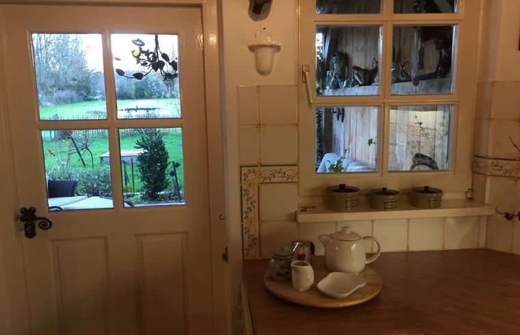 View from the kitchen of Holiday Home in Epen, South Limburg, of the garden.