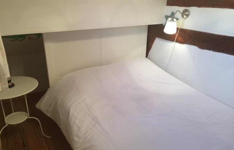 Cozy bedroom with double bed in Holiday home in Epen, South Limburg.