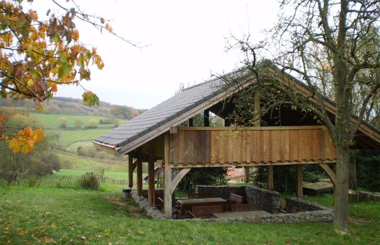 Vacation home in Vijlen, South Limburg with wooden veranda and beautiful views of the rolling countryside of Limburg.