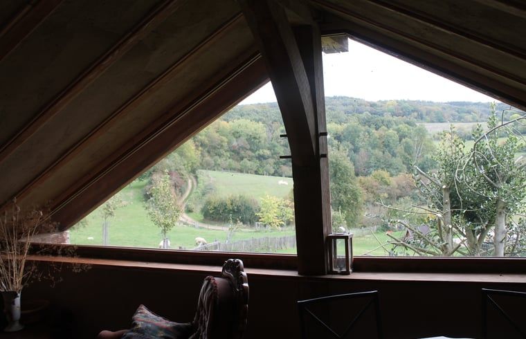 View from the Holiday Home in Vijlen, South Limburg, with panoramic views of the green hills of Limburg.