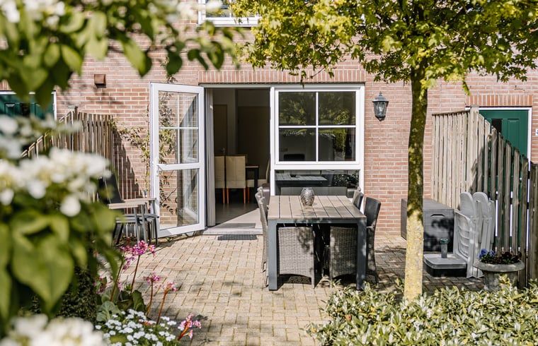 Geniessen Sie den sonnigen Garten des Ferienhauses in Gulpen - Wittem, einem charmanten Ferienhaus im malerischen Suedlimburg, Limburg.