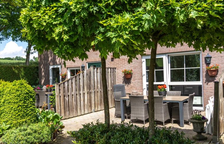 Geniessen Sie den gruenen Aussenbereich des Ferienhauses in Gulpen - Wittem, das im malerischen Suedlimburg liegt und perfekt zum Entspannen ist.