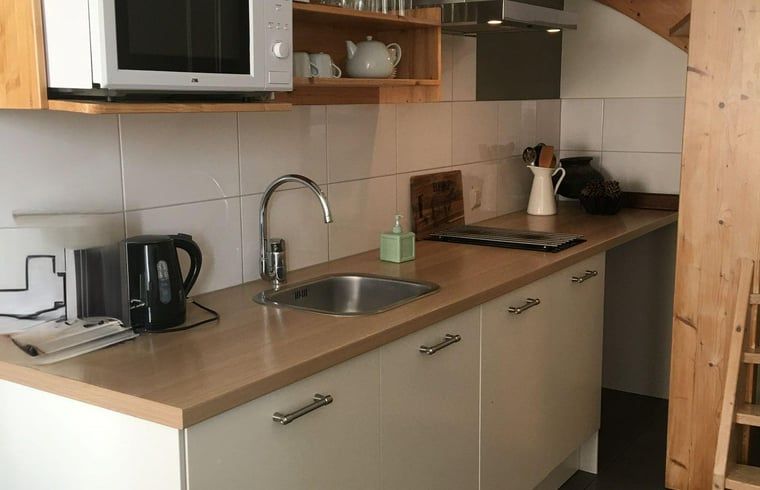 Moderne keukenfaciliteiten in Vakantiehuis in Scheulder, Zuid Limburg.