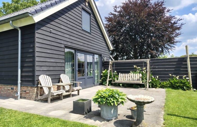 Welcome to Huisje in Zeeland, a cozy vacation home with garden views in De Peel, North Brabant.