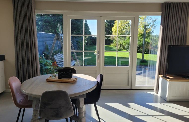 Cozy living room in Cottage in Zeeland with comfortable seating area in De Peel, North Brabant.