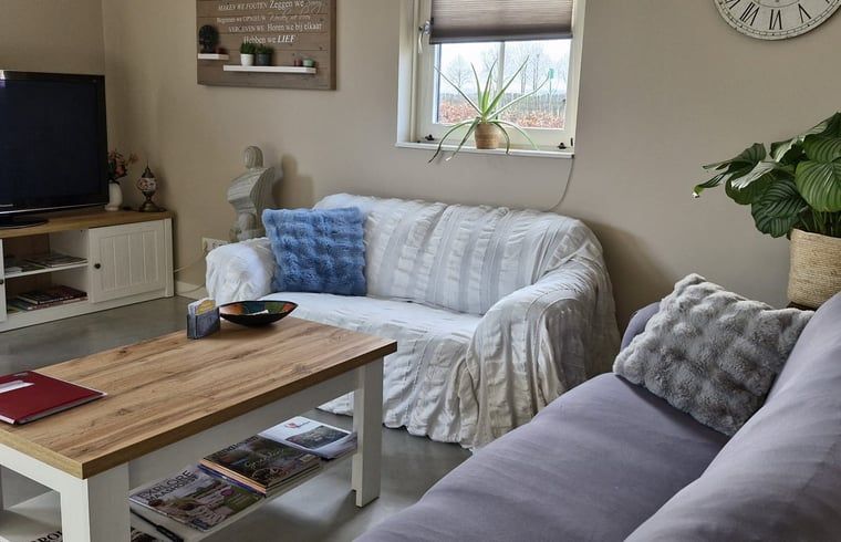 Modern bathroom and toilet in Cottage in Zeeland, a perfect vacation home in De Peel, North Brabant.