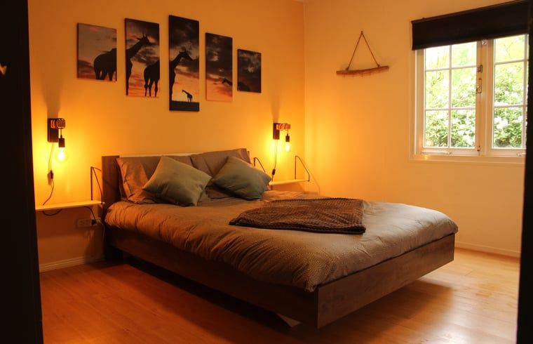 Sfeervolle slaapkamer in Huisje in Lage Mierde, vakantiehuis in de Kempen, Noord Brabant.