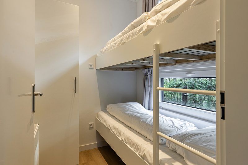 Bunk bed in child-friendly room of Bosvlucht 6 persons Wellness vacation home, Lage Mierde, Kempen.