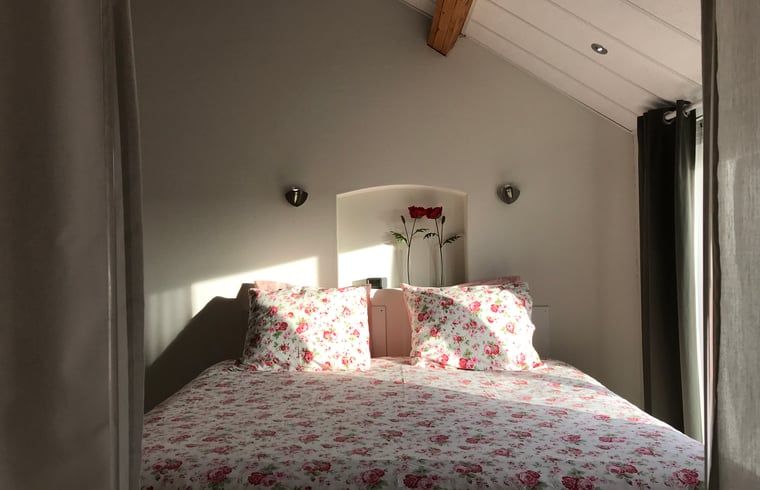 Gemuetliches Schlafzimmer im Ferienhaus in Baarle Nassau, entspannender Aufenthalt in Kempen, Nordbrabant.