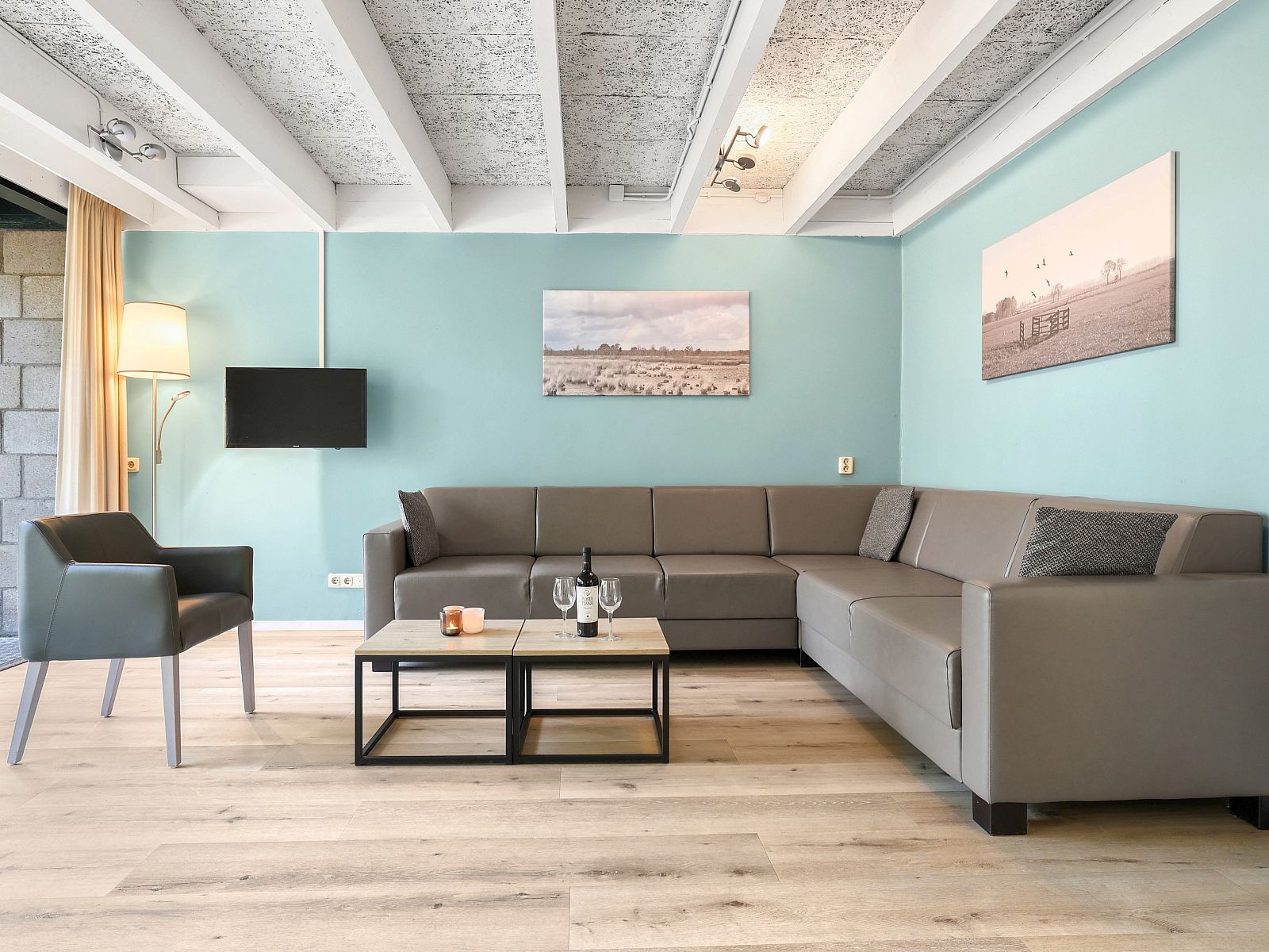 Dining table overlooking terrace in Het Vennenbos bungalow, Hapert, North Brabant.
