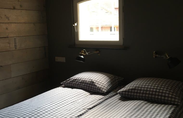 Cozy bedroom in Holiday home in Oisterwijk, North Brabant. Comfortable beds for a relaxing stay in the heart of Brabant.