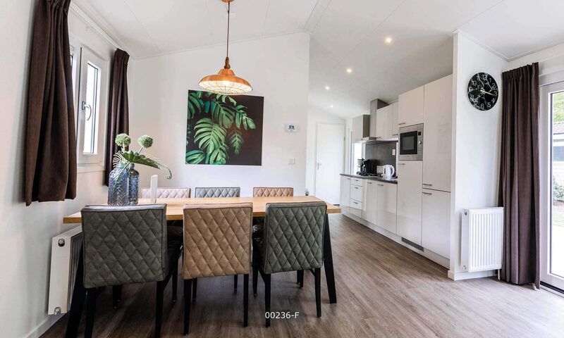Dining area in Ferox 5 persons vacation home in Cromvoirt, Heart of Brabant, North Brabant with stylish interior.
