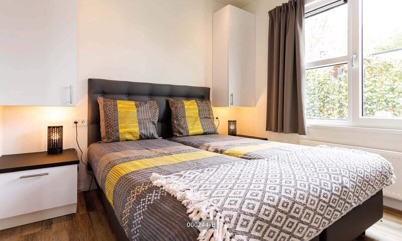 Comfortabele slaapkamer in Z Module 6 personen Wellness, vakantiehuis in Cromvoirt, Noord Brabant, met modern interieur.