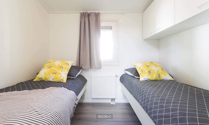 Schlafzimmer mit zwei Einzelbetten in Rialto 6 Personen Ferienhaus, Cromvoirt, Nordbrabant.