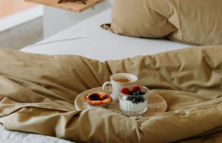 Breakfast in bed at Holiday Home in Chaam, North Brabant with coffee and delicacies in Heart of Brabant.