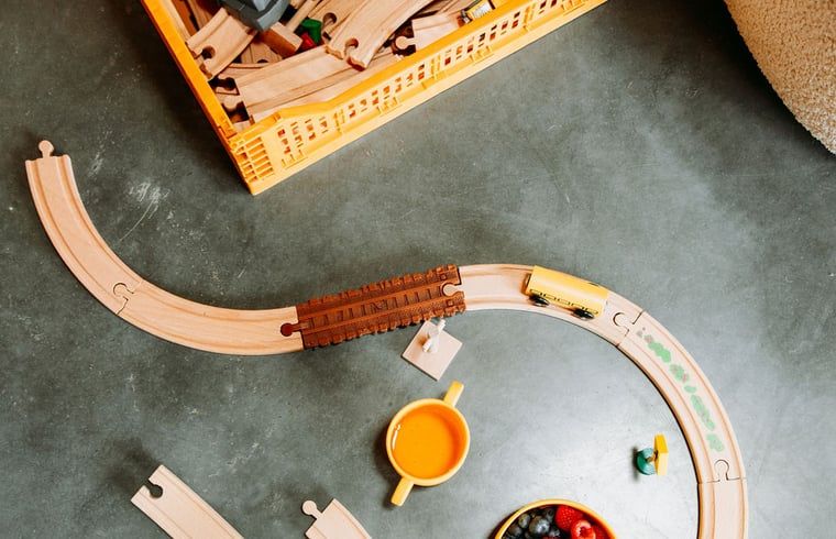 Toy train on the floor of Holiday home in Chaam, North Brabant, child-friendly environment in Heart of Brabant.