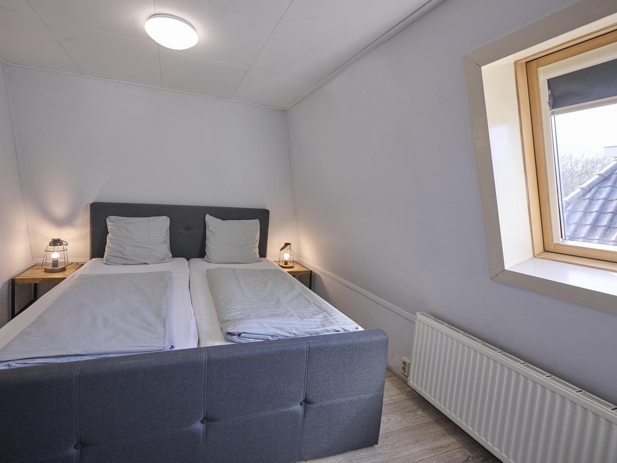 Slaapkamer met tweepersoonsbed in 't Kaatsheuveltje 1 vakantiehuis in Kaatsheuvel, Hart van Brabant, Noord Brabant