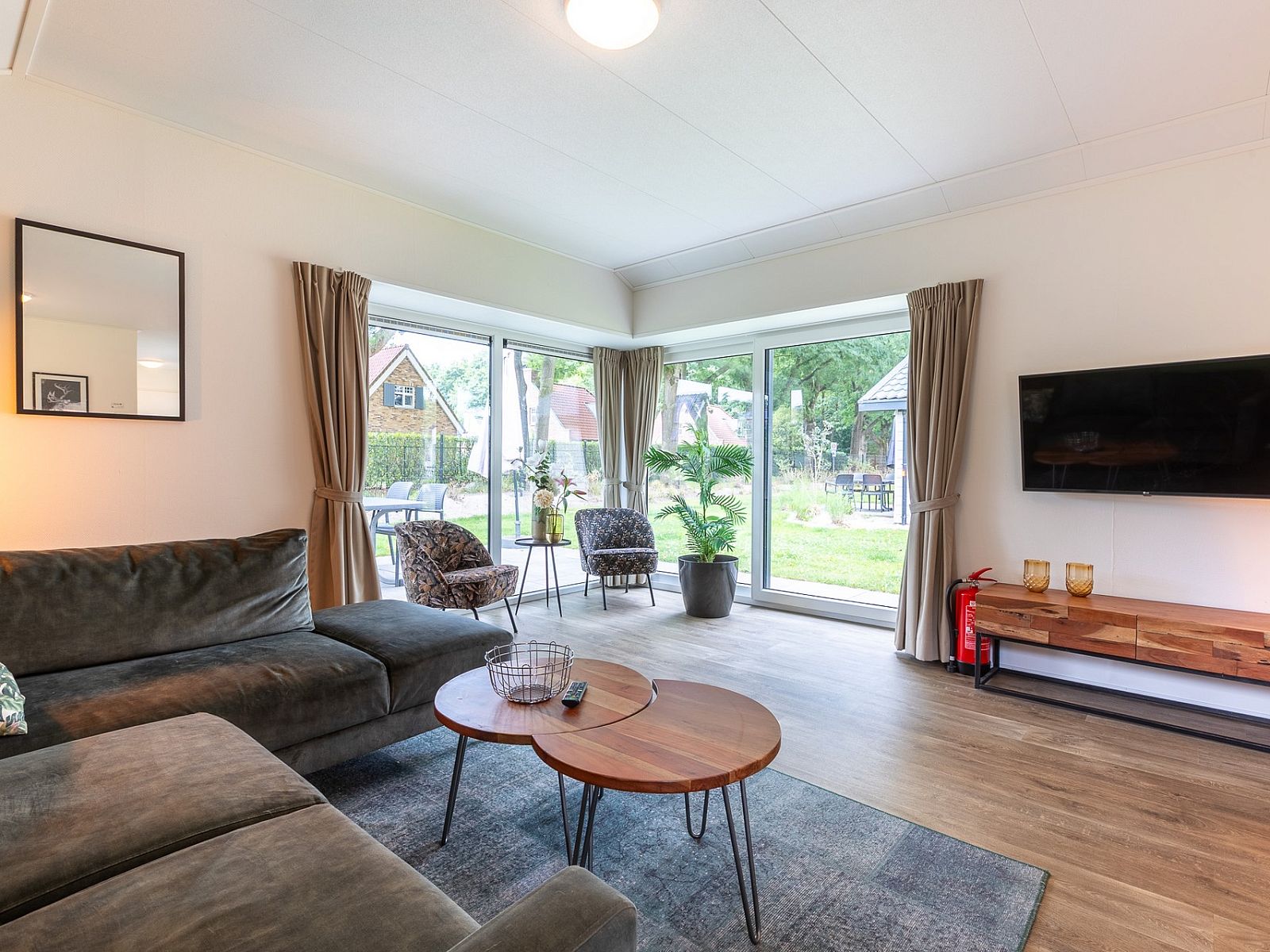 Gemtliche Sitzecke im Chalet in Kaatsheuvel, Ferienhaus mit Aussicht in Hart van Brabant.