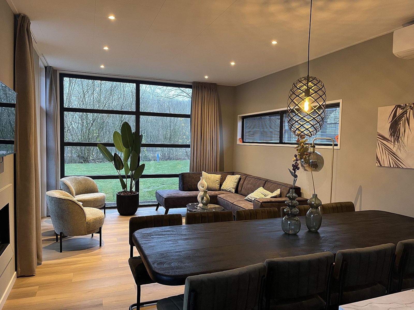 Stylish living room of Detached house in Kaatsheuvel, North Brabant overlooking green surroundings.