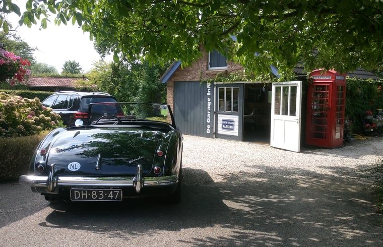 Classic car for Cottage in Hank, vacation home in Heart of Brabant, North Brabant, with nostalgic charm.