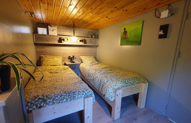 Comfortabele slaapkamer in Vakantiehuisje in Tilburg, Hart van Brabant.