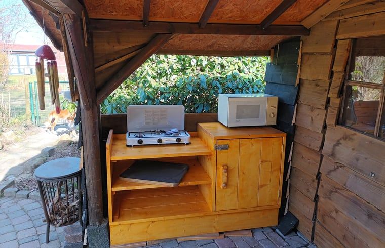 Buitenkoken bij Vakantiehuisje in Best, praktische buitenkeuken in Hart van Brabant, Noord Brabant.